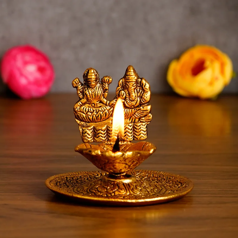 Goddess Laxmi & Lord Ganesha Golden Metal Diya - Home & Kitchen by K R Trader Enterprises