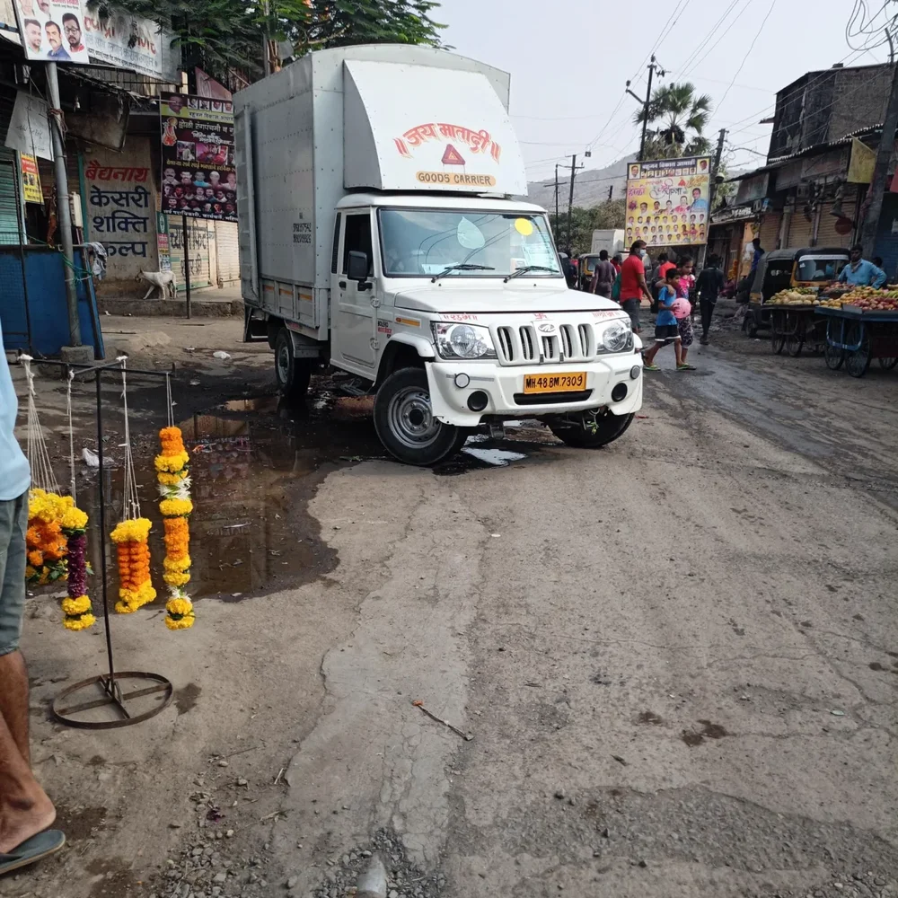 BOLERO Mini Truck Rental Service - Business & Professional Services by Guru Laxmi & Co.