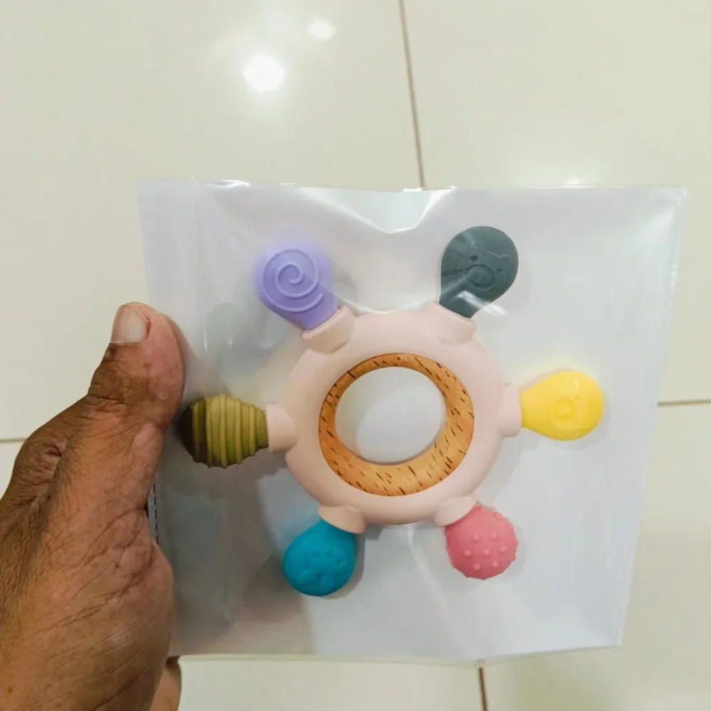 Silicone and Wood Baby Teether with Rattle - Sports, Toys & Games by Shree Anant International