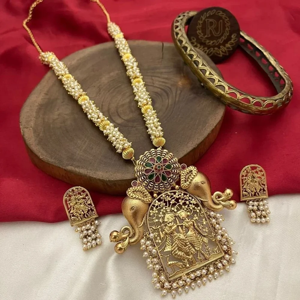 Golden Oval Wedding Jewellery Set for Females - Gems & Jewelry by Neil Exports