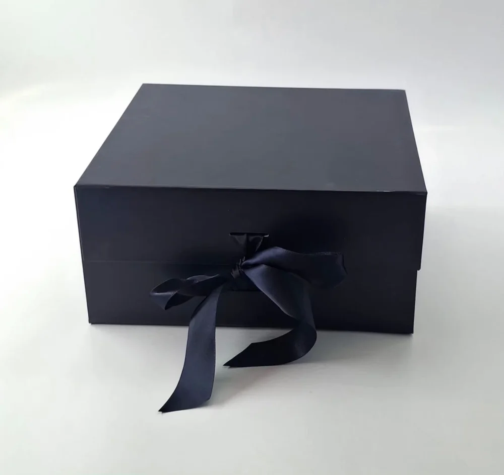 Rigid Gift Hamper Boxes with Ribbon Tie Closure - Packaging & Printing by Hindustan Handmade Paper Products